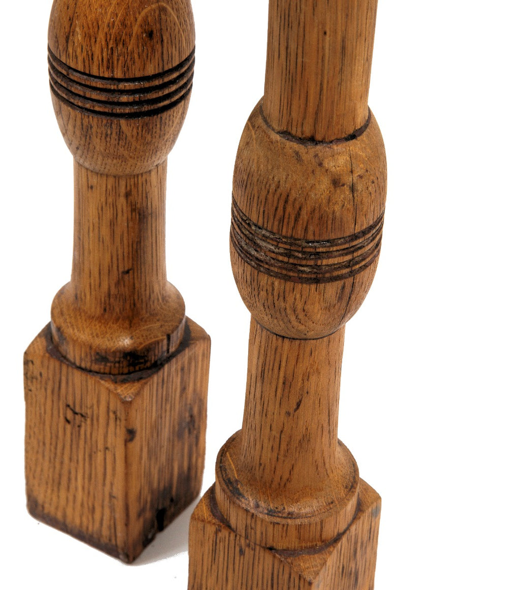 matching set of custom-designed staircase oak wood spindles from adler and sullivan's max. m. rothschild rowhouses (1883), located at 3201-3205 south indiana avenue, chicago, il.