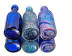 group of three chicago privy dug cobalt blue john a. lomax soda bottles