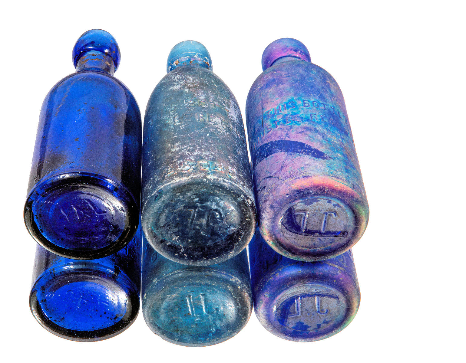 group of three chicago privy dug cobalt blue john a. lomax soda bottles