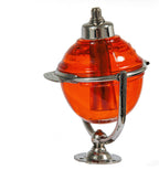 well-maintained original early 20th century penn station interior lavatory tilting glass orb soap dispenser