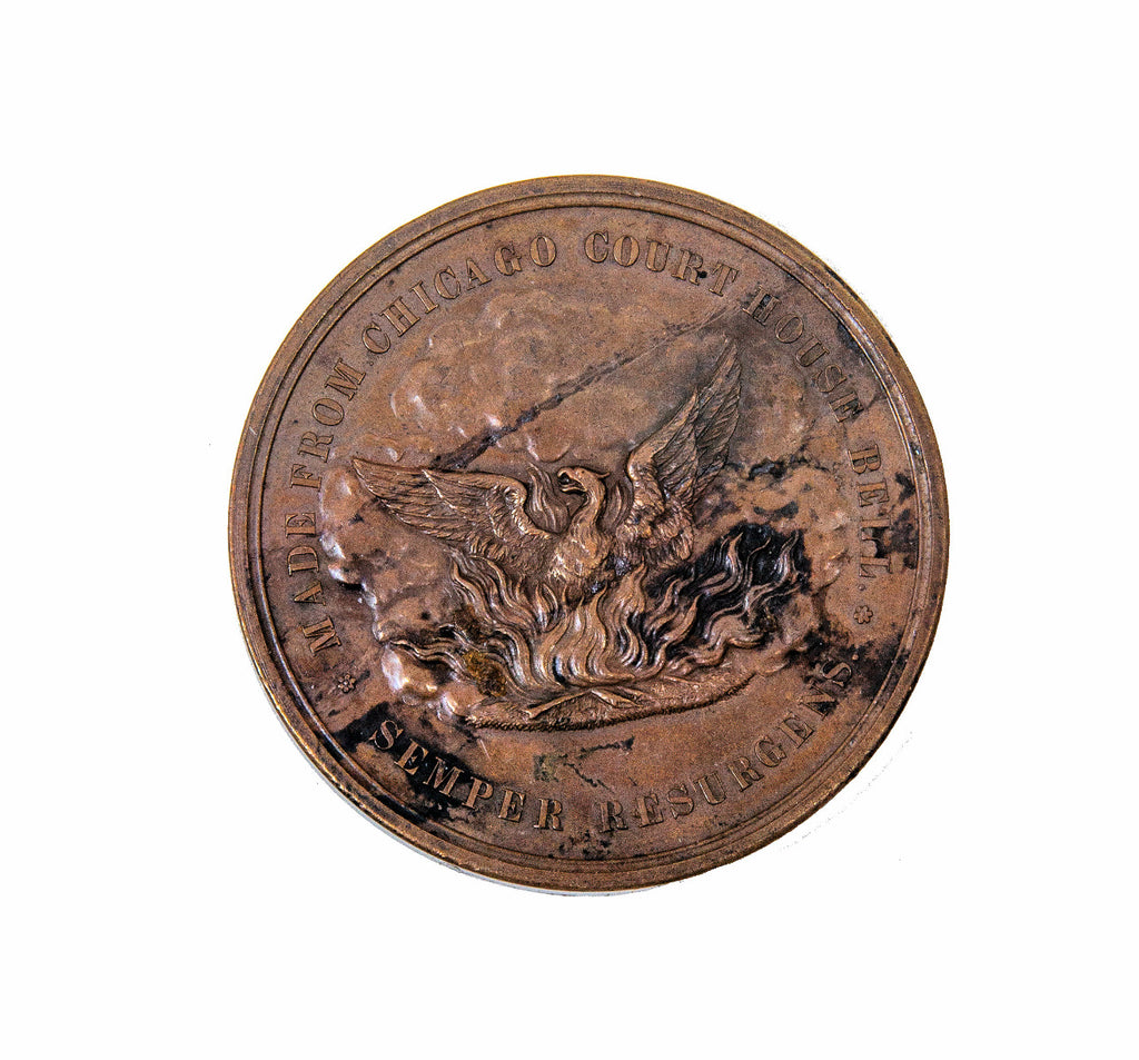 pocket-sized "souvenir" medal representing the first anniversary of the "great chicago fire" of 1871