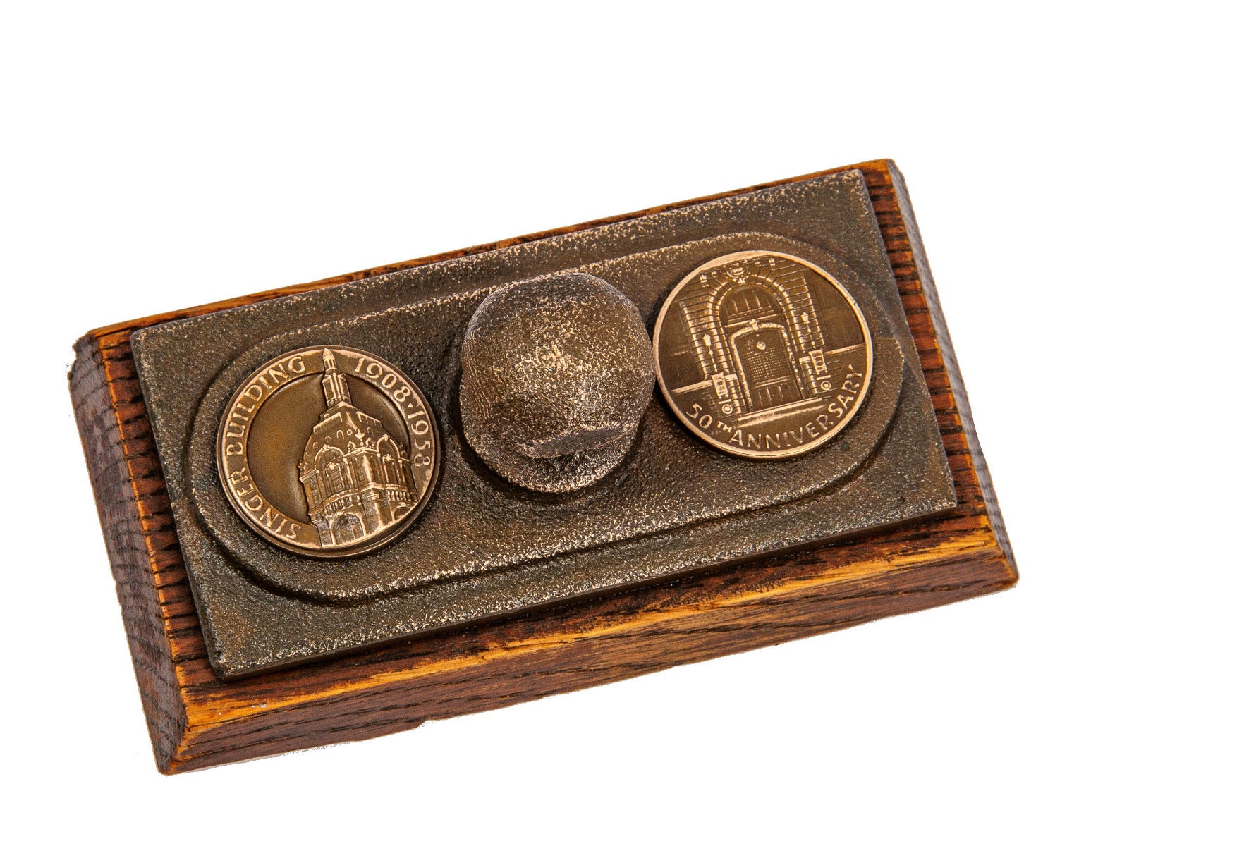 unusual 50th anniversary new york city singer building paperweight comprised of bronze and oak wood salvaged from the lobby