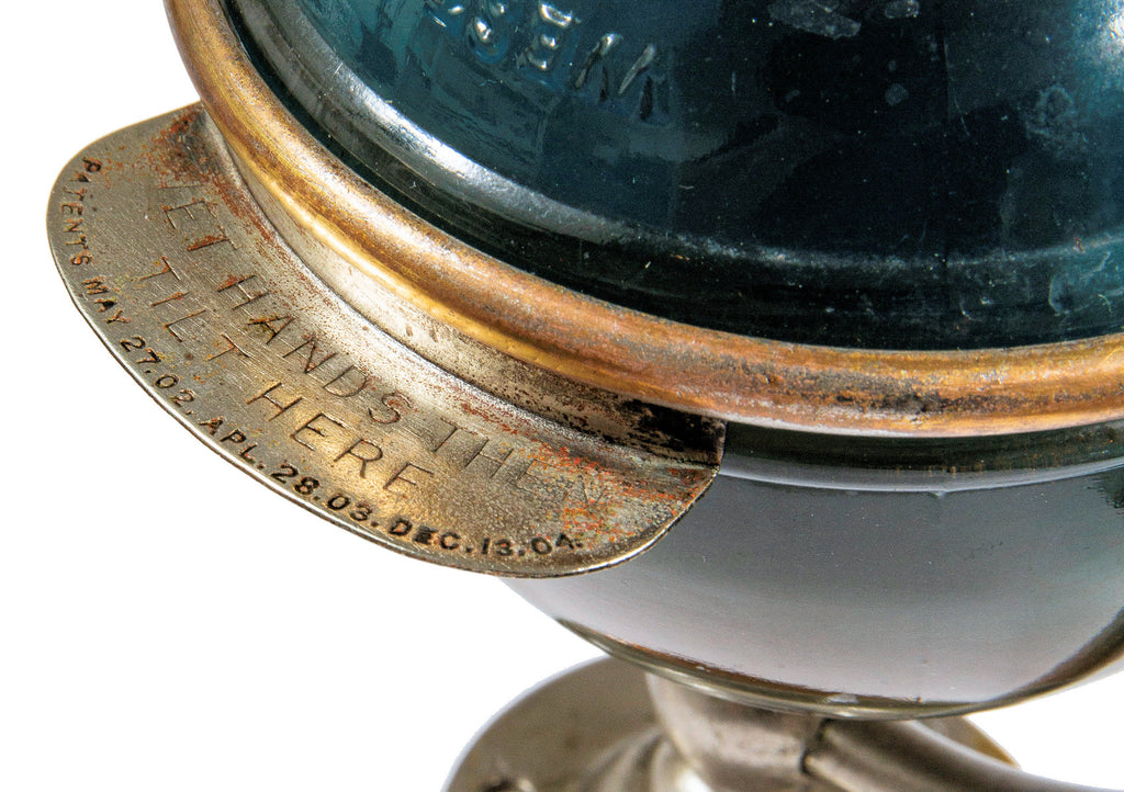 original early 20th century new york city penn station interior lavatory tilting glass orb soap dispenser