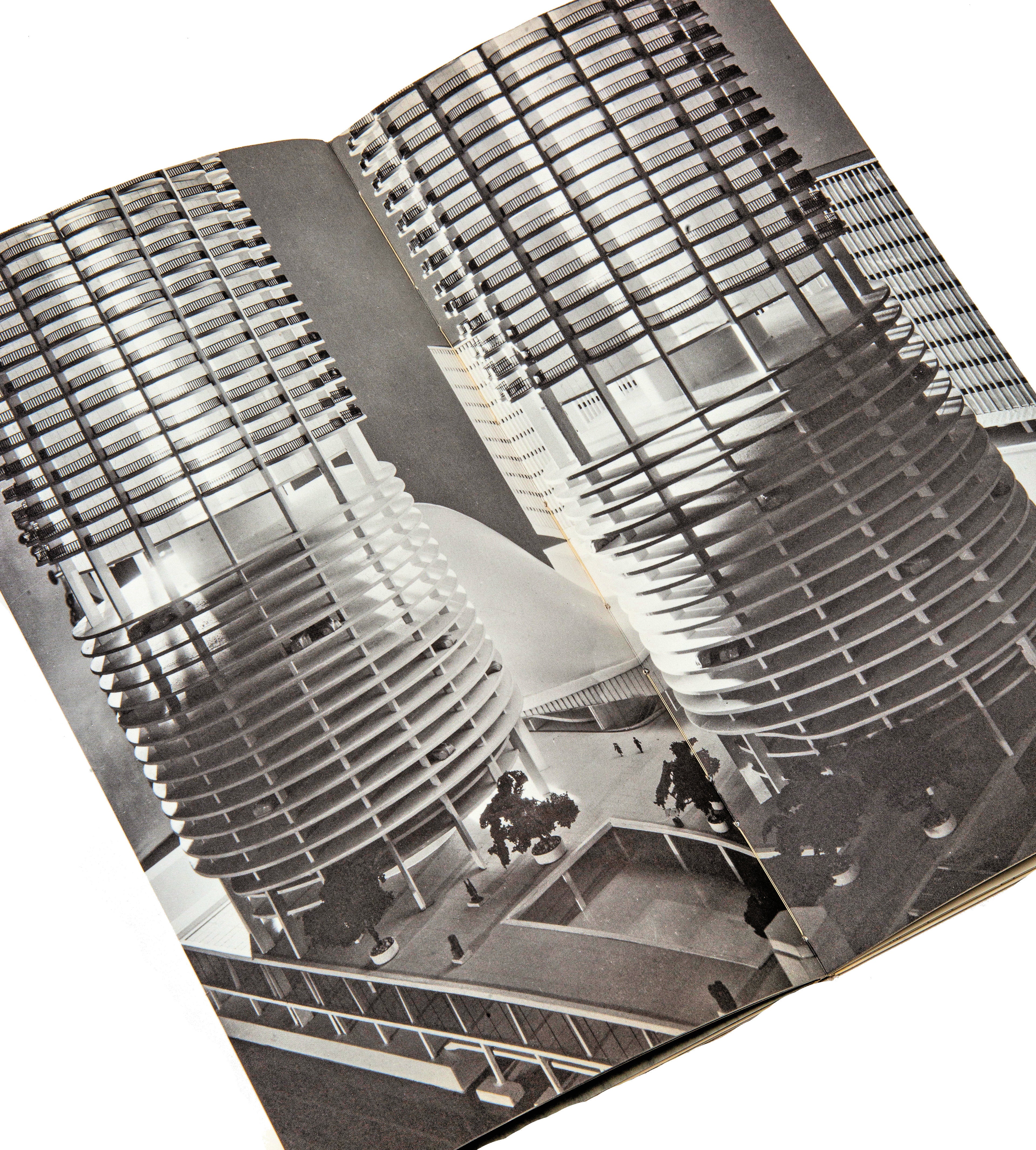 original and largely intact 1962 marina city (bertrand goldberg, 1964-68) prospectus showcasing the building’s distinctive architectural elements with floor plans, site layouts, models, and photographs.