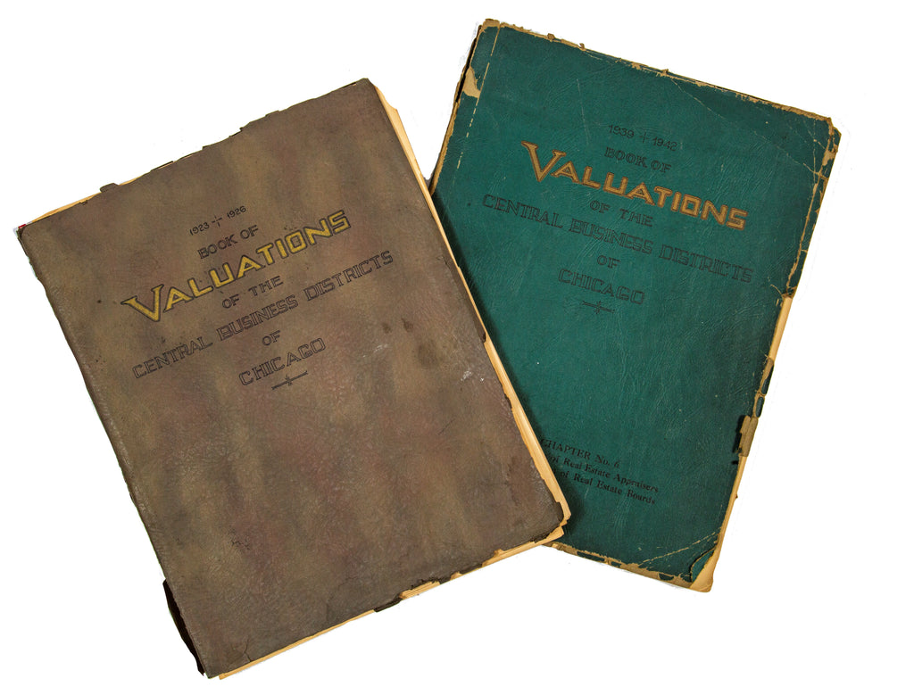 two original "book of valuations of the central business districts of chicago" for the years 1927-1930 and 1939-1942.