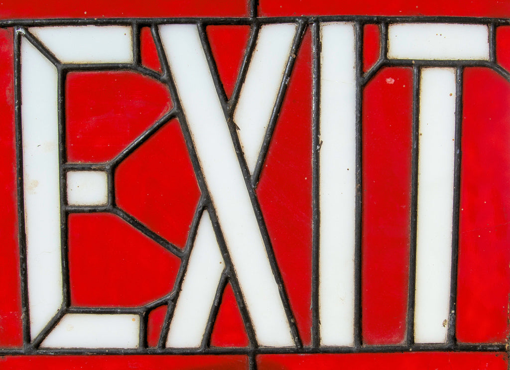 original 1928 stained glass exist sign salvaged from racine's venetian theater