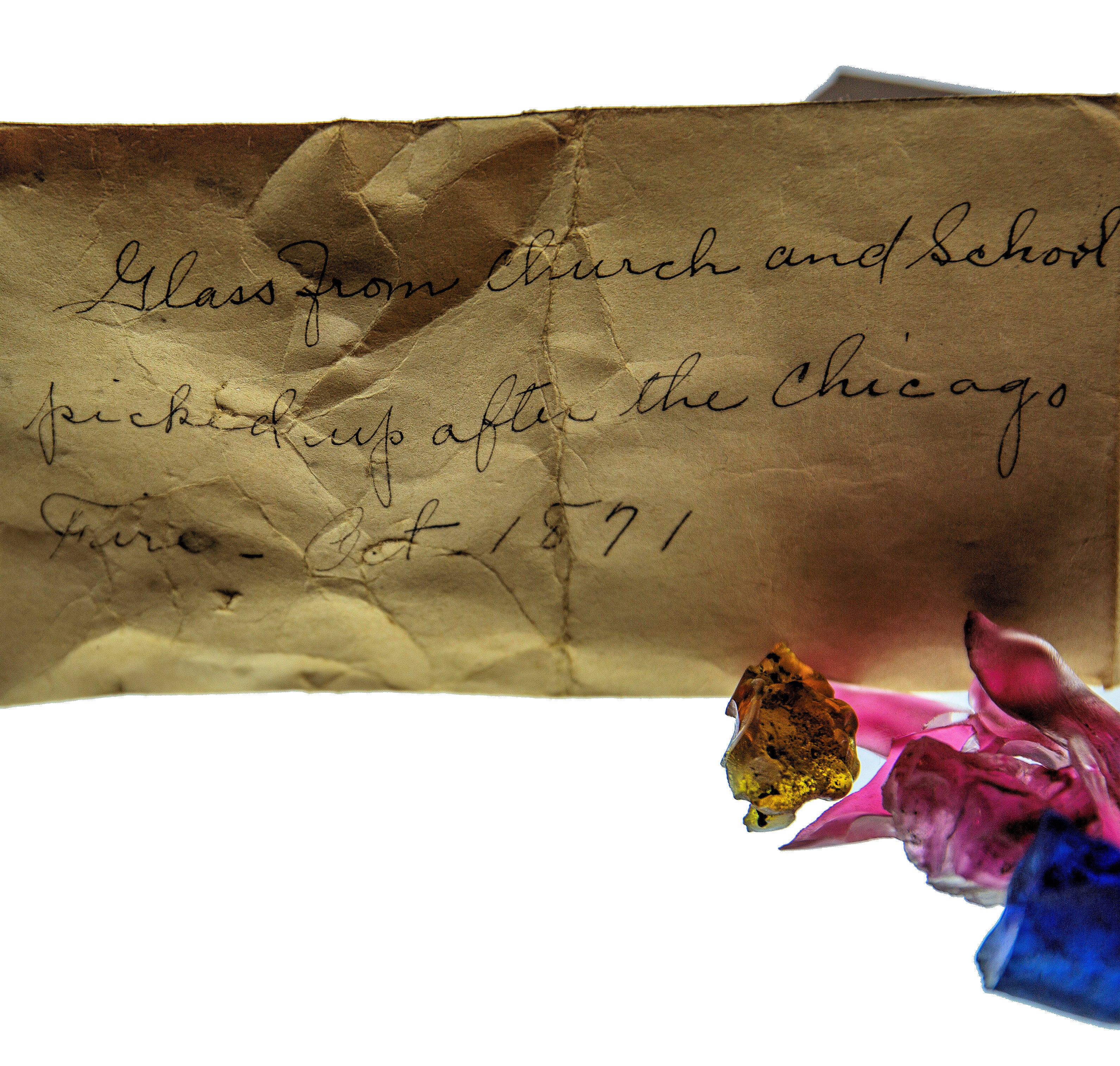 glass fragments salvaged as souvenirs from a "church and school" in the burned district around the time of the great chicago fire of 1871