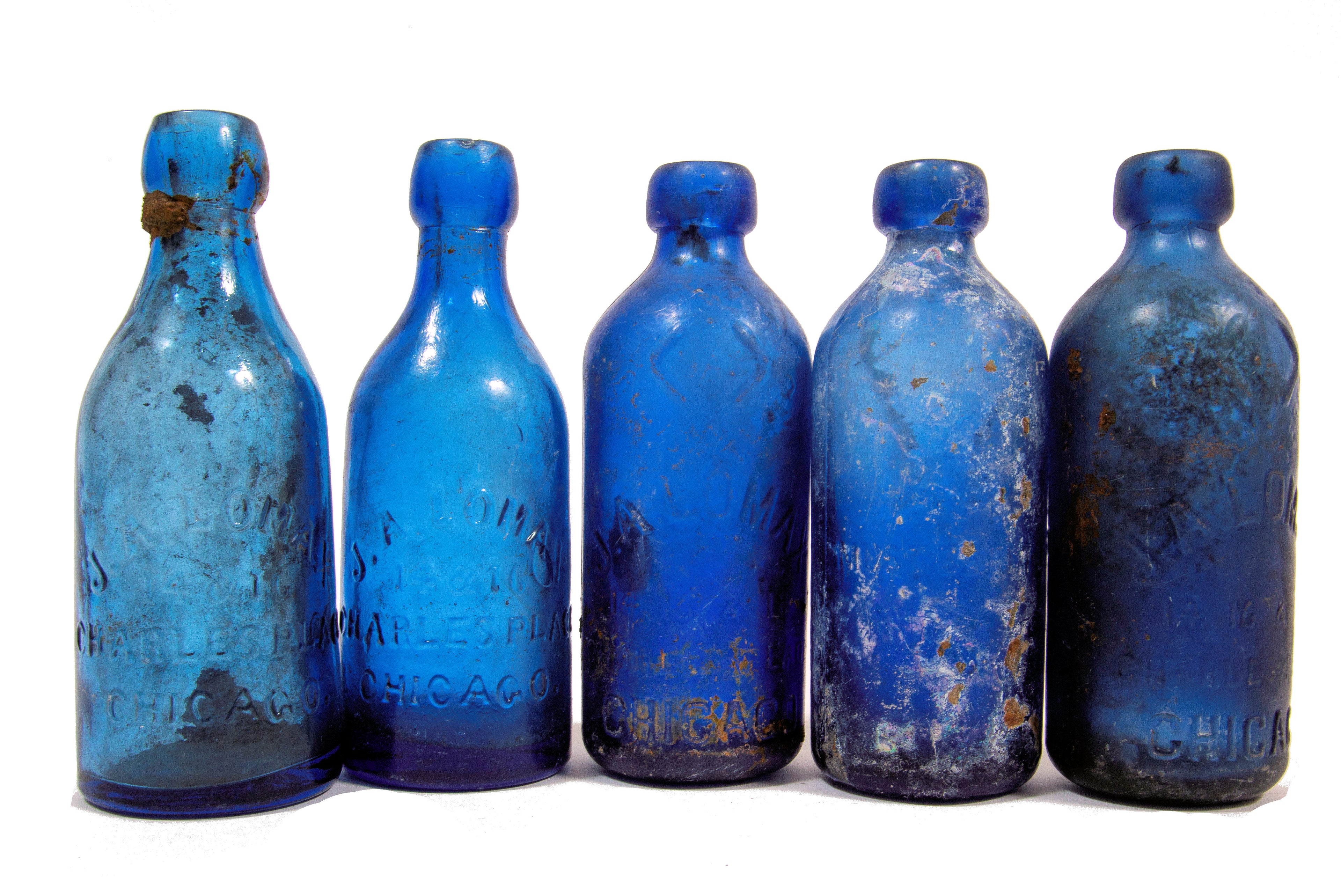group of 1860s-1880s dug chicago cobalt blue john a. lomax soda bottles