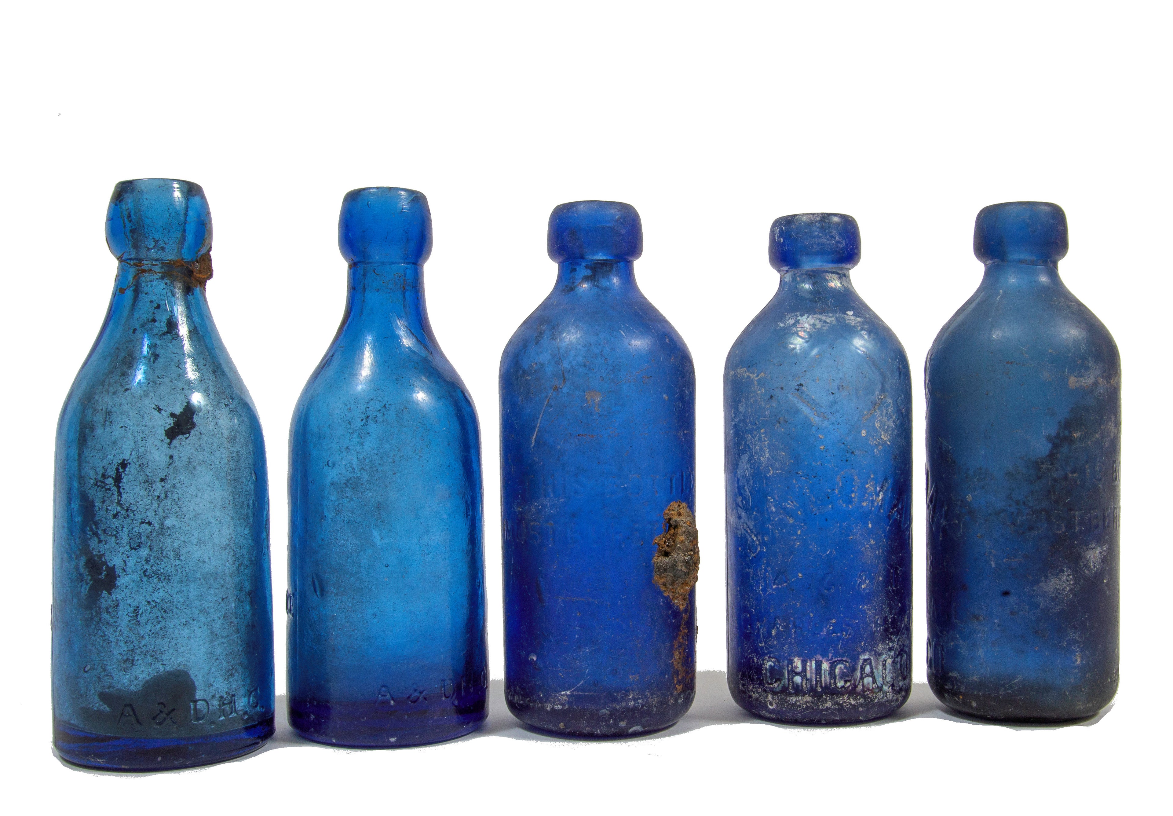 group of 1860s-1880s dug chicago cobalt blue john a. lomax soda bottles