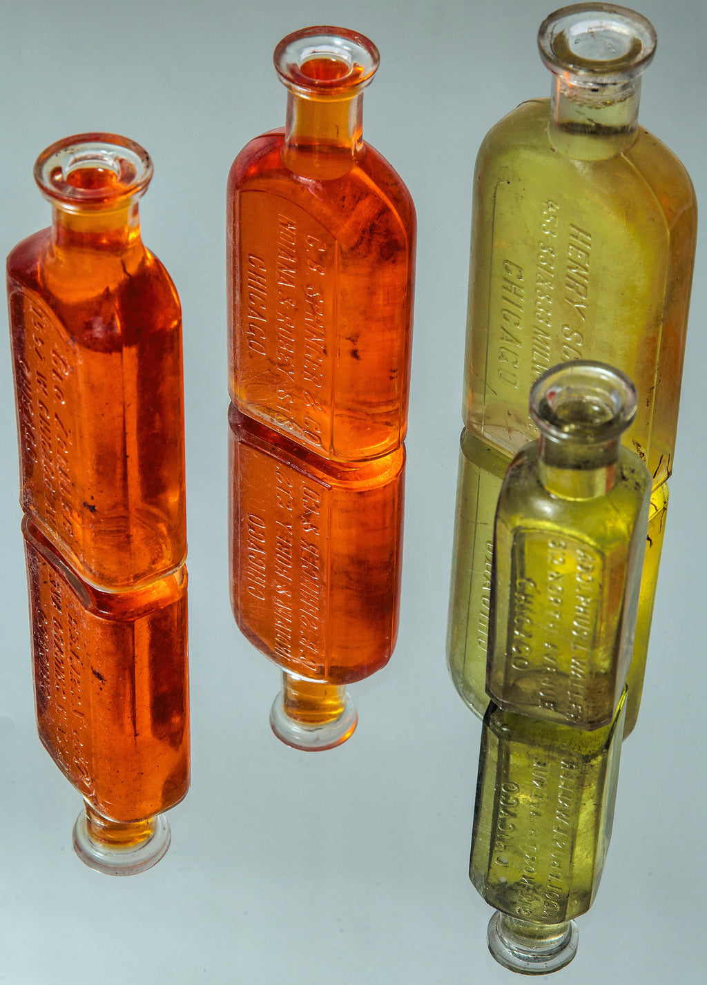 group of late 19th and early 20th century dug chicago druggists glass bottles