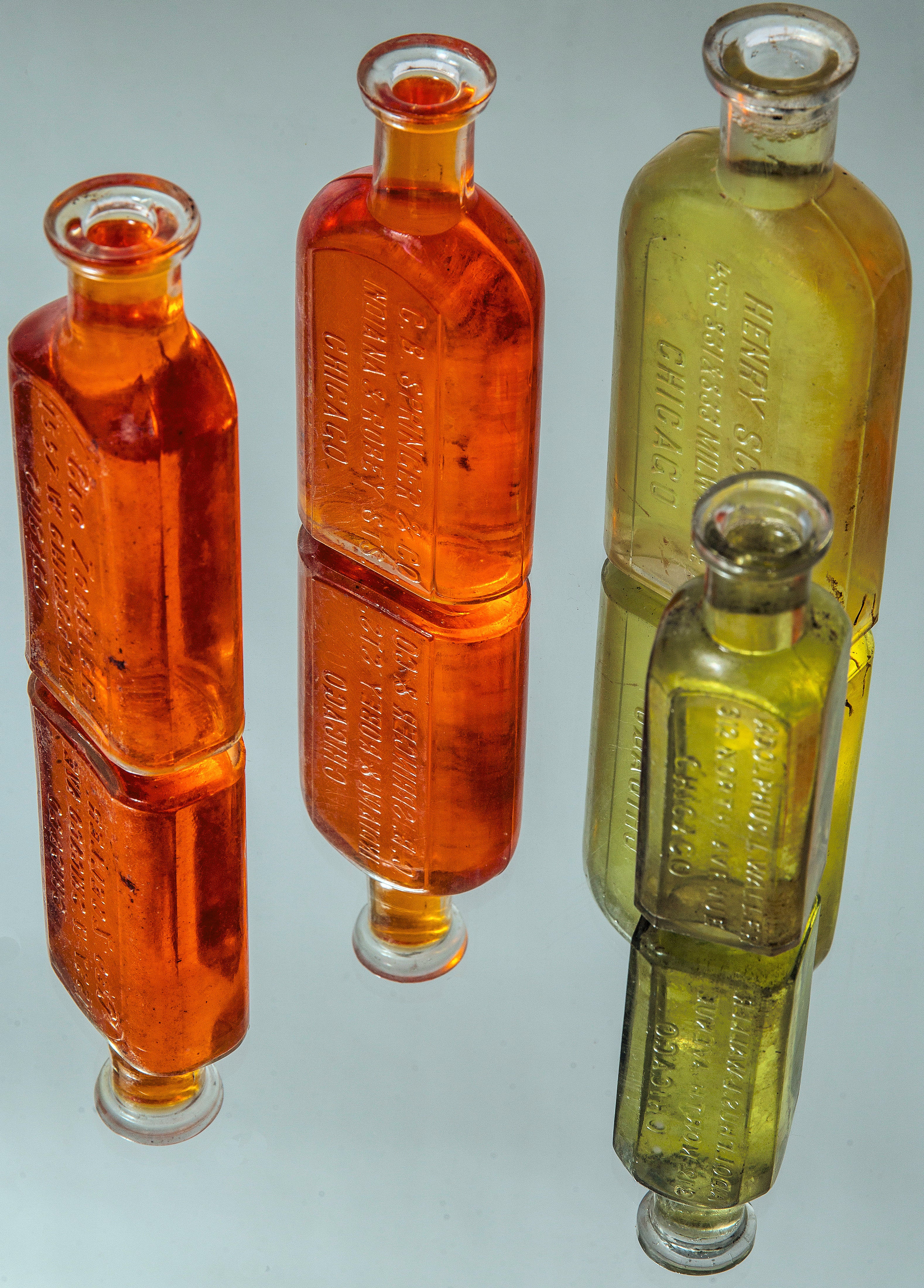 group of late 19th and early 20th century dug chicago druggists glass bottles