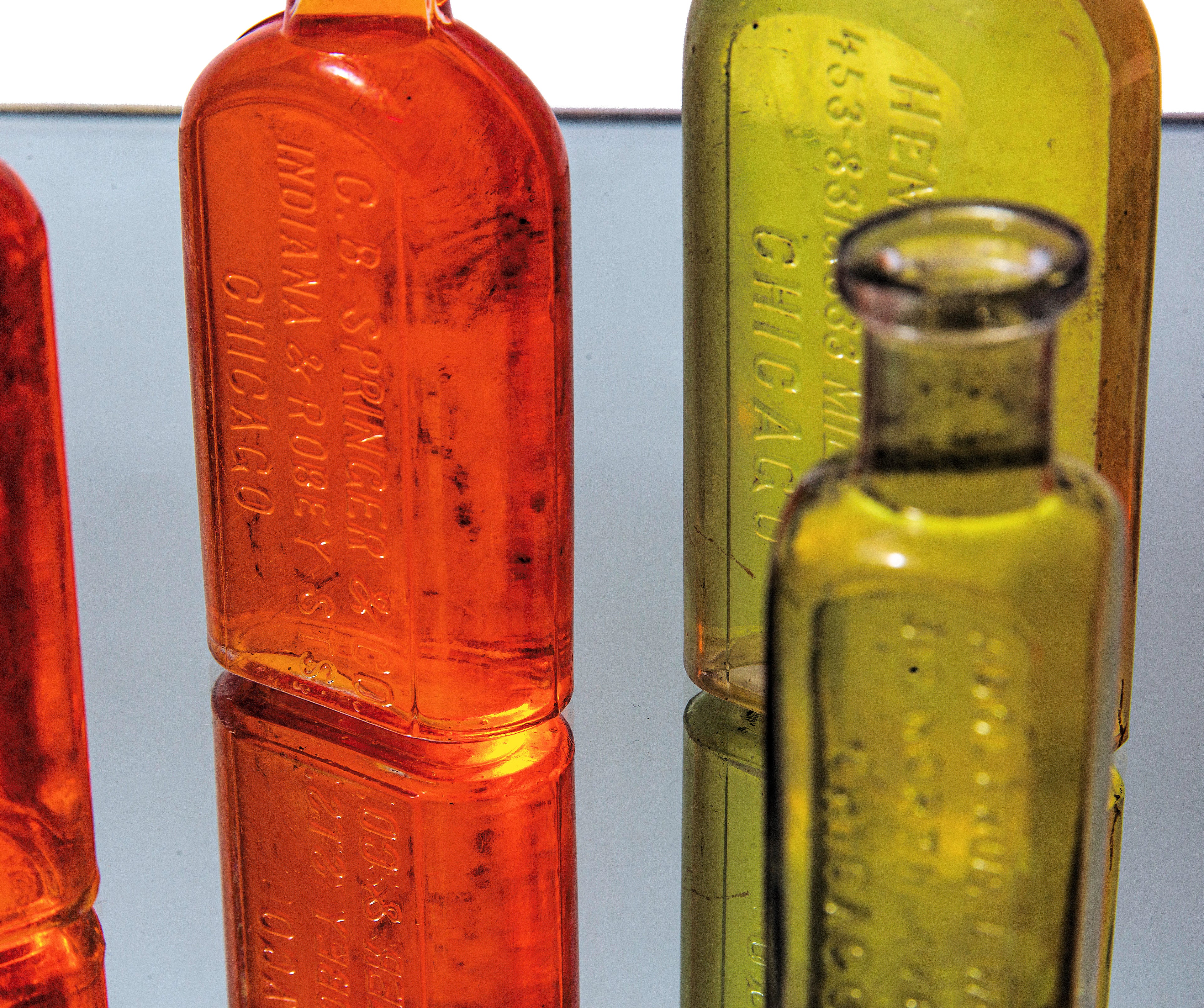 group of late 19th and early 20th century dug chicago druggists glass bottles