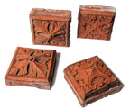 group of four 1880s red slip-glazed ornamental terra cotta blocks salvaged from la crosse, wisc. post office demolished in 1965