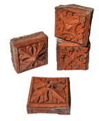 group of four 1880s red slip-glazed ornamental terra cotta blocks salvaged from la crosse, wisc. post office demolished in 1965