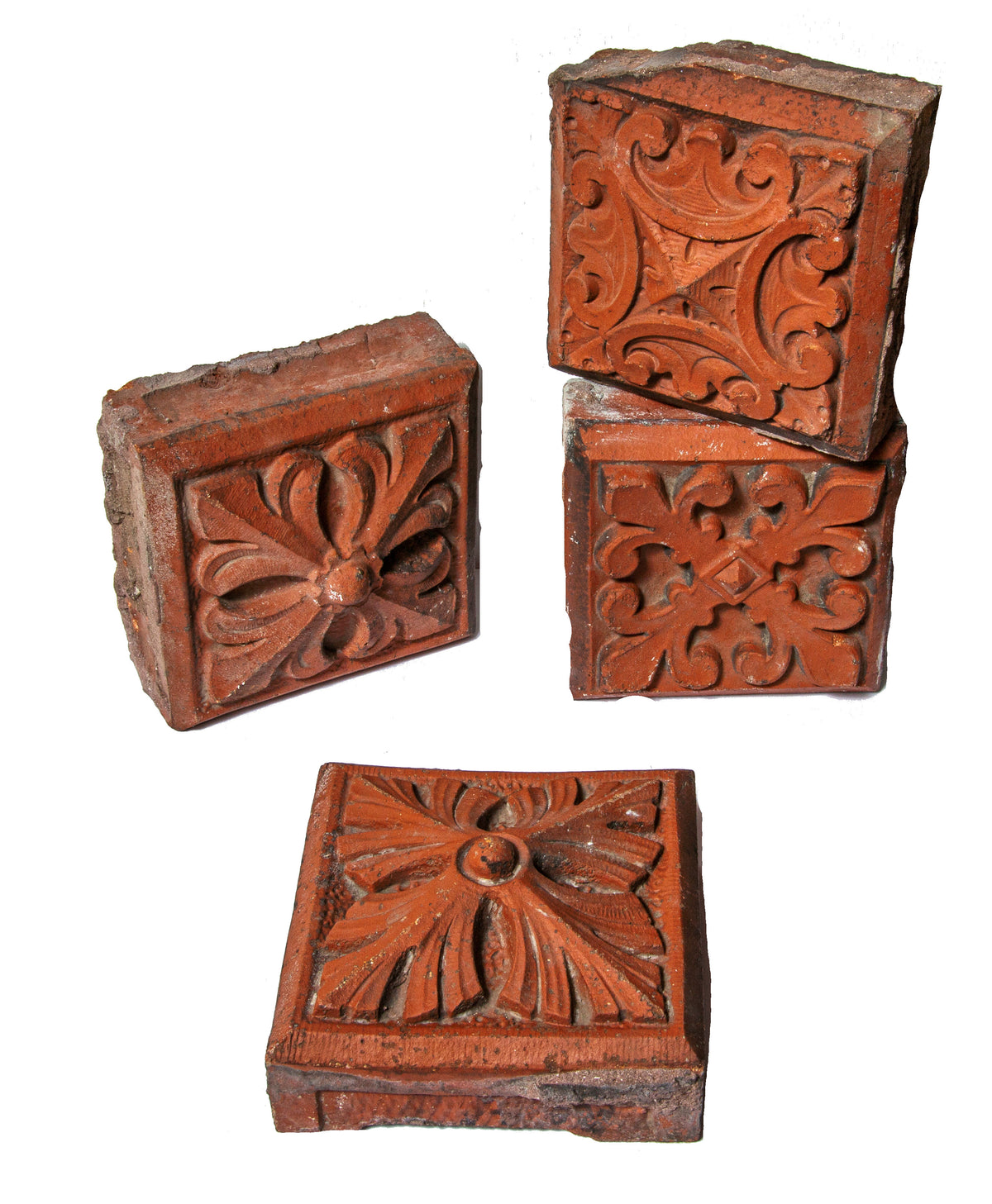 group of four 1880s red slip-glazed ornamental terra cotta blocks salvaged from la crosse, wisc. post office demolished in 1965