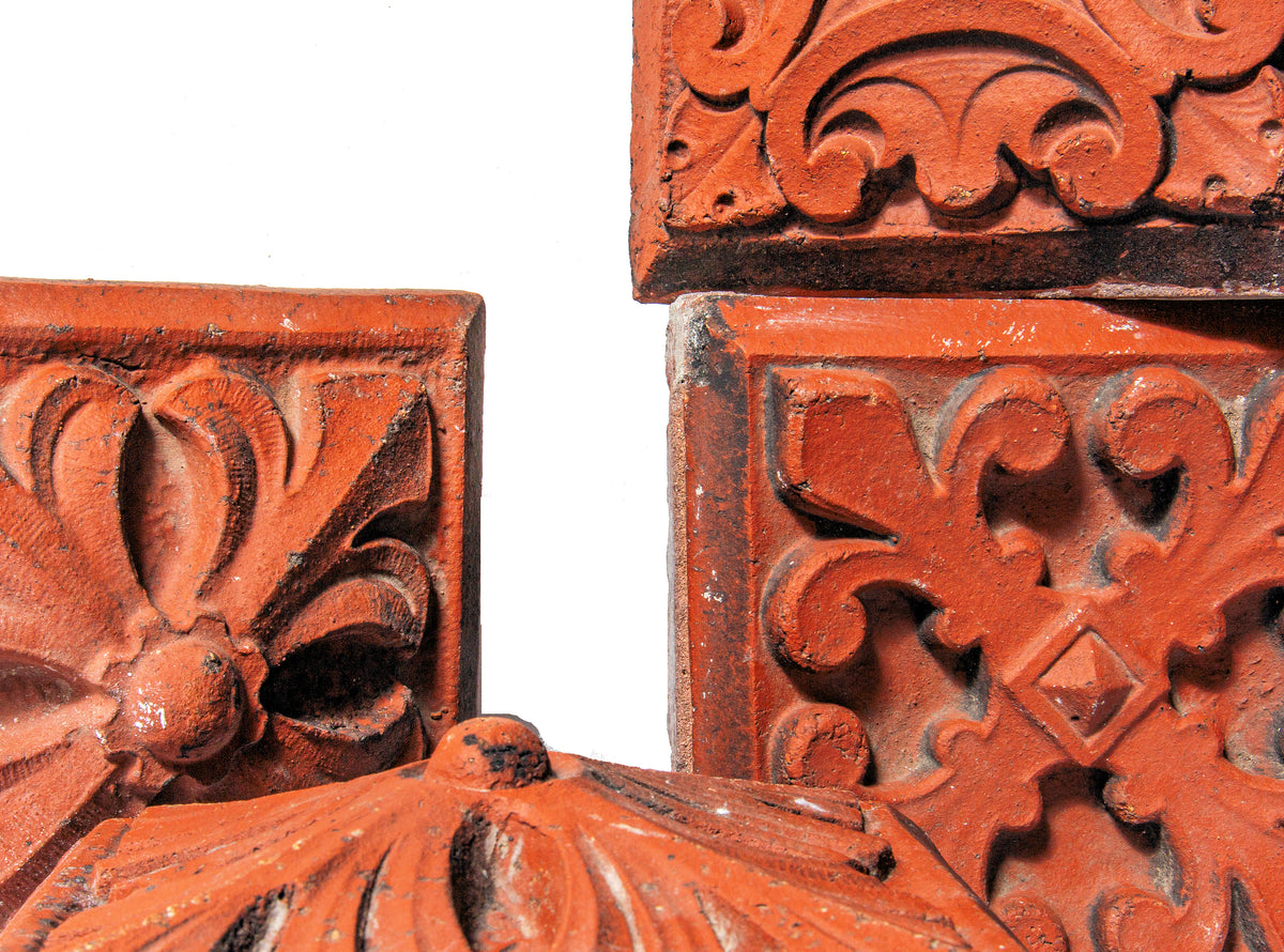 group of four 1880s red slip-glazed ornamental terra cotta blocks salvaged from la crosse, wisc. post office demolished in 1965