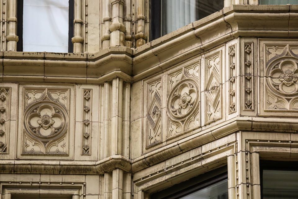 pair of historically important white-glazed exterior reliance building terra cotta panels with allover crazing