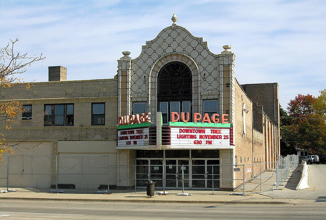 historically important late 1920's american exterior black glazed terra cotta figural dupage theater  facade "comedy" head or mask fragment with flowing hair