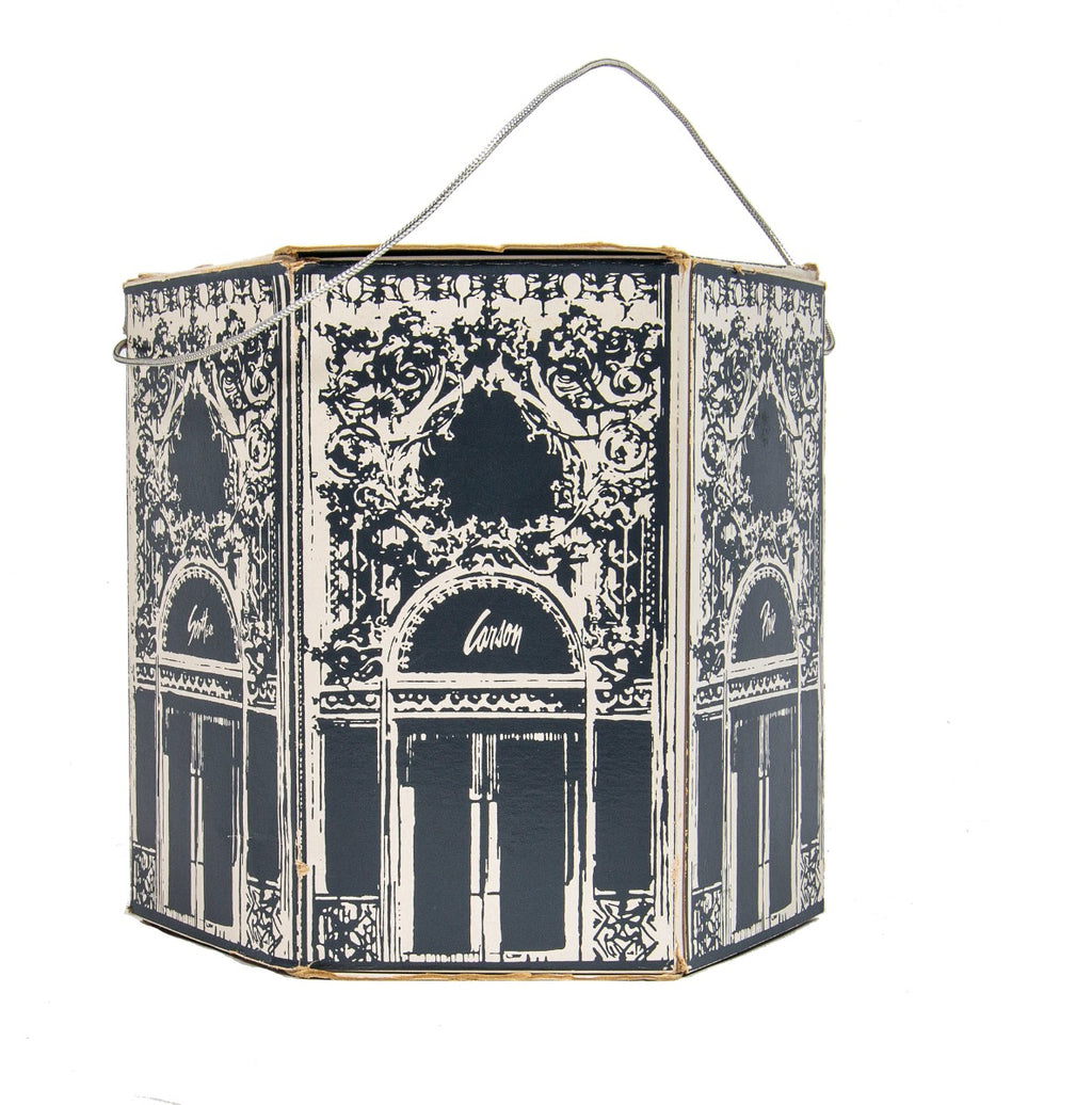 unique 1950s hexagonal-shaped vintage carson, pirie, scott hatbox featuring building's northwest entrance
