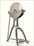 REPURPOSED LATE 19TH OR EARLY 20TH CENTURY SINGLE FREESTANDING FOUR-LEGGED CURVACEOUS FOOT-OPERATED AMERICAN INDUSTRIAL GRINDER MACHINE BASE WITH NEWLY ADDED TOP