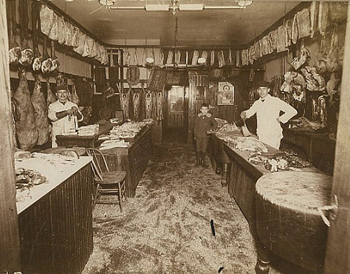 original and expertly-built c. early 20th century american freestanding hard maple wood butcher block table with finely turned legs