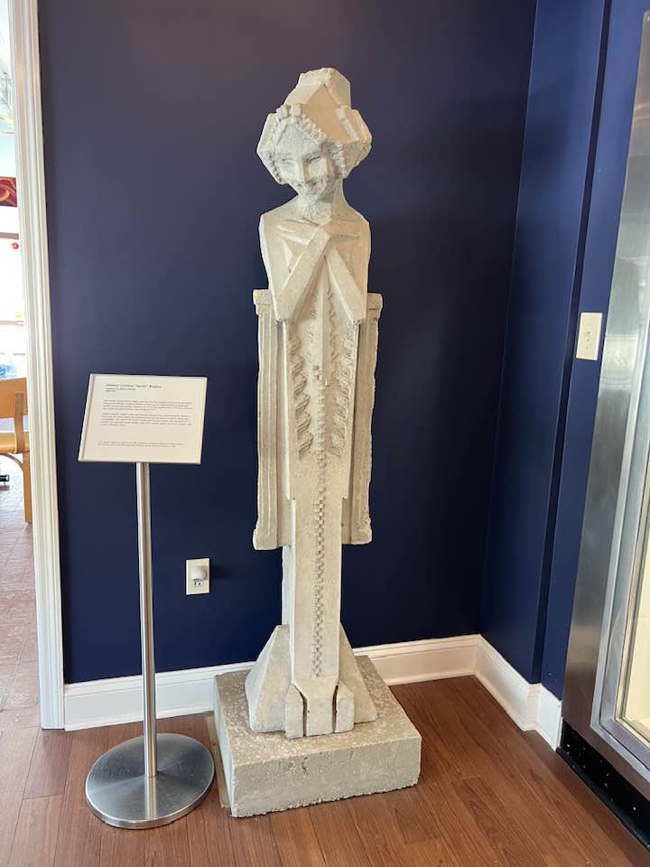 limited edition frank lloyd wright and alfonso iannelli-designed patinated composite midway gardens sprite or "spindle" head cast from original