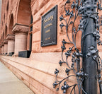 original john wellborn root-designed ornamental cast iron doorknob and matching backplate from the society for savings building