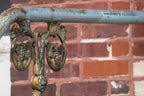 hard to find original 19th century ornamental cast iron exterior residential staircase pipe or stair rail bracket with intricate leafage and scrollwork
