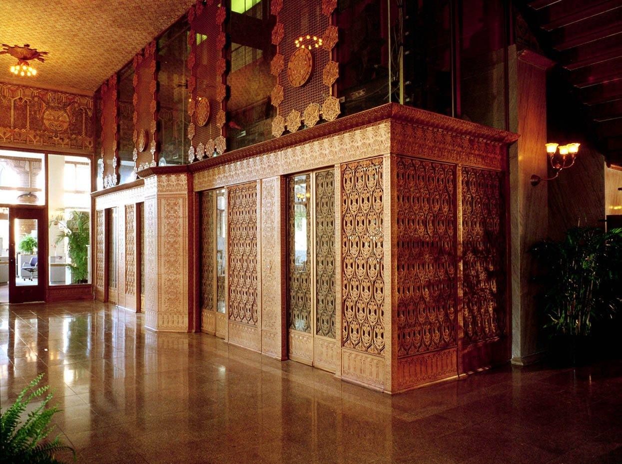 faithfully recreated louis h. sullivan-designed guaranty building interior lobby elevator medallion