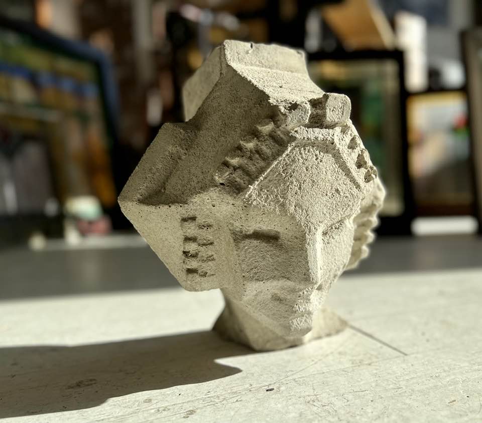 limited edition frank lloyd wright and alfonso iannelli-designed patinated composite midway gardens sprite or "spindle" head cast from original