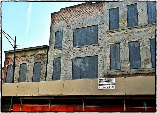 original 1880's primitive antique american interior chicago commercial building apartment door with five raised panels and distressed paint finish