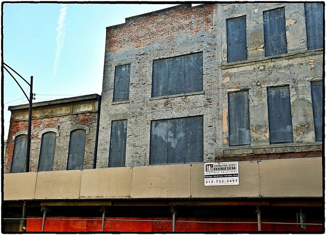 worn and weathered intact solid walnut pre-fire chicago interior commercial building newel post with a nicely turned and tapered profile