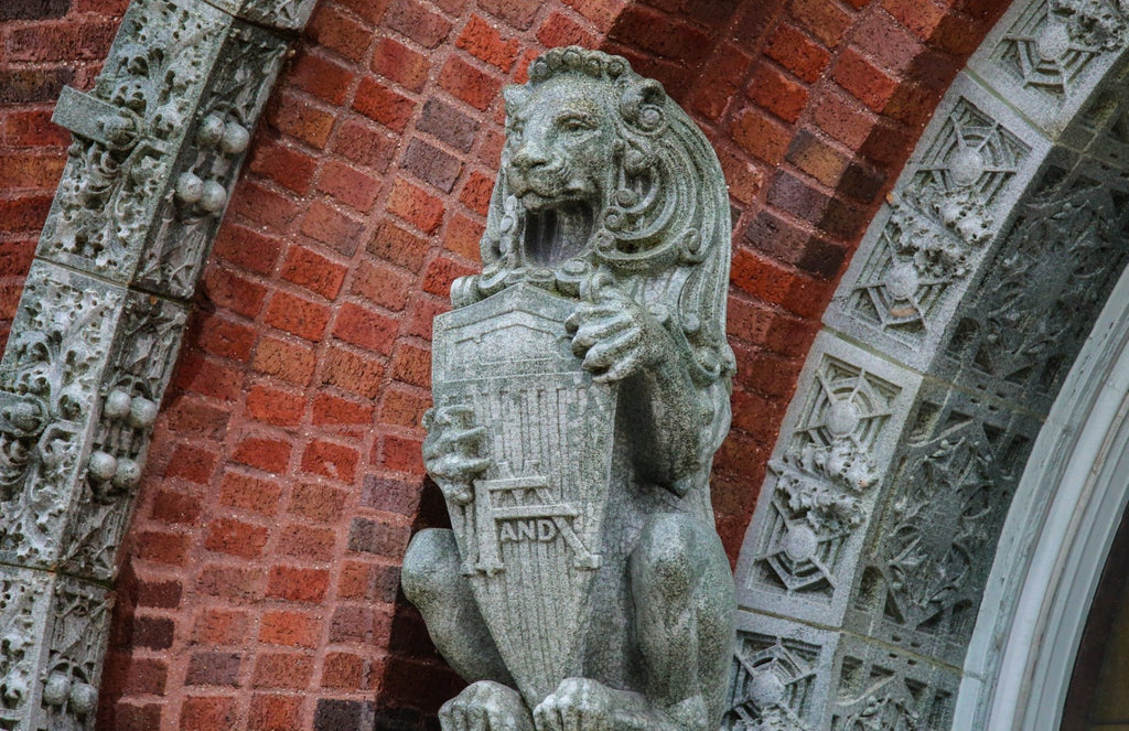 original full-figured 1918 louis h. sullivan-designed speckle glazed terra cotta rearing lion sculpted by kristian schneider