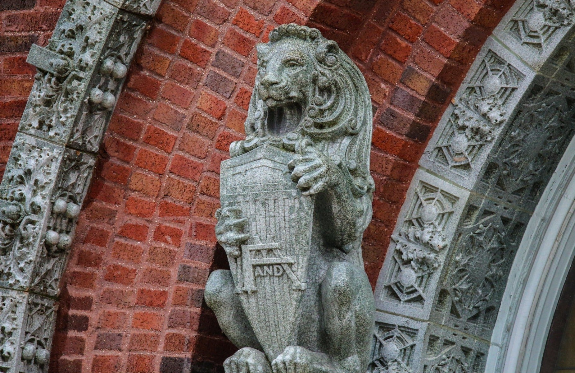 original full-figured 1918 louis h. sullivan-designed speckle glazed terra cotta rearing lion sculpted by kristian schneider