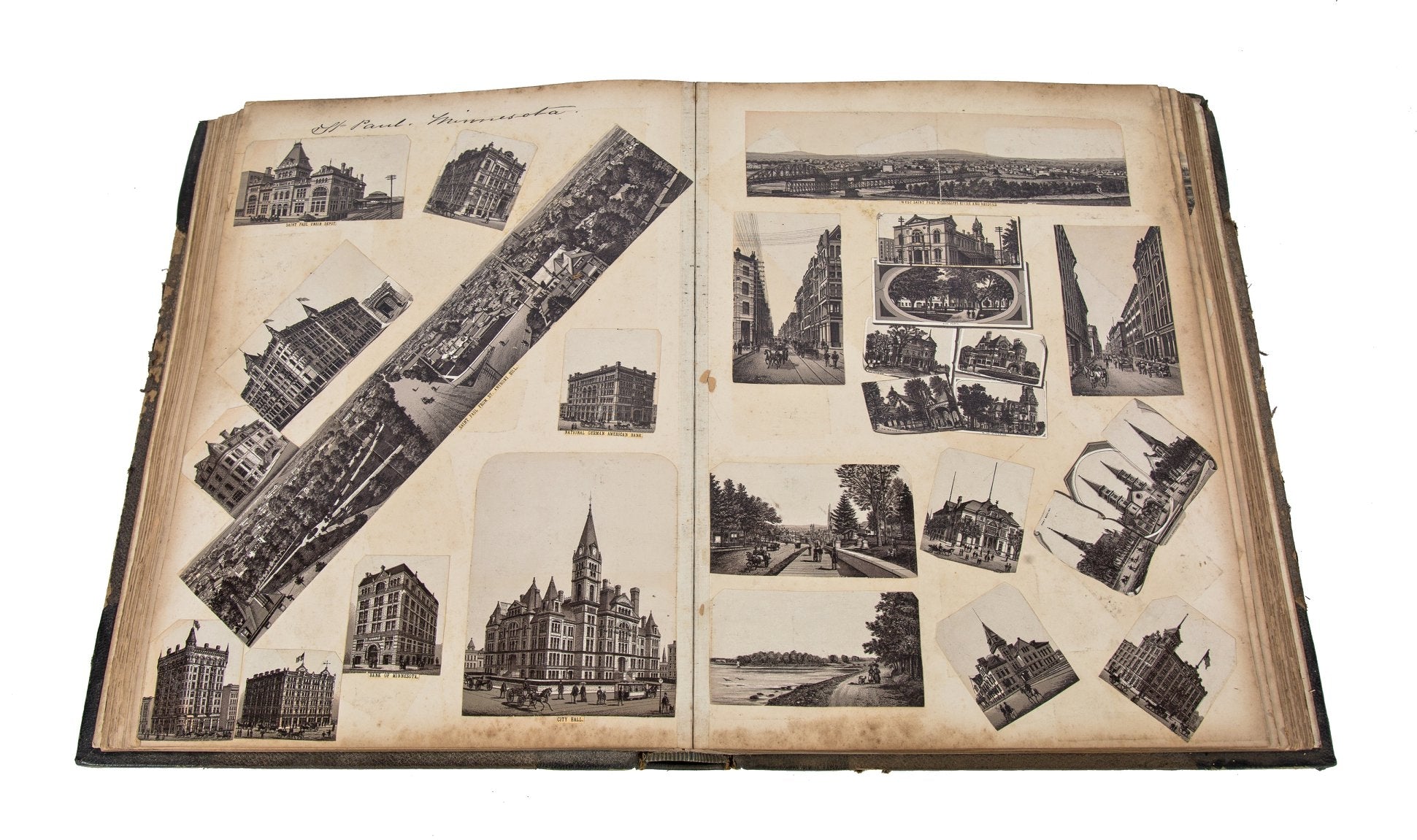 amazingly intact late 19th century hardbound scrapbook containing a combination of albumen prints and lithographs of major american cities