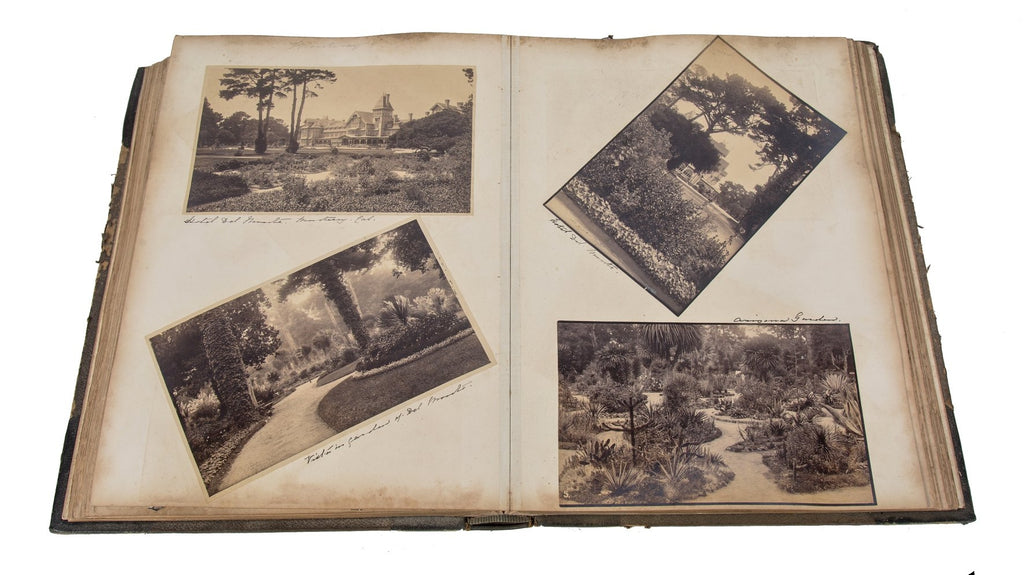 amazingly intact late 19th century hardbound scrapbook containing a combination of albumen prints and lithographs of major american cities