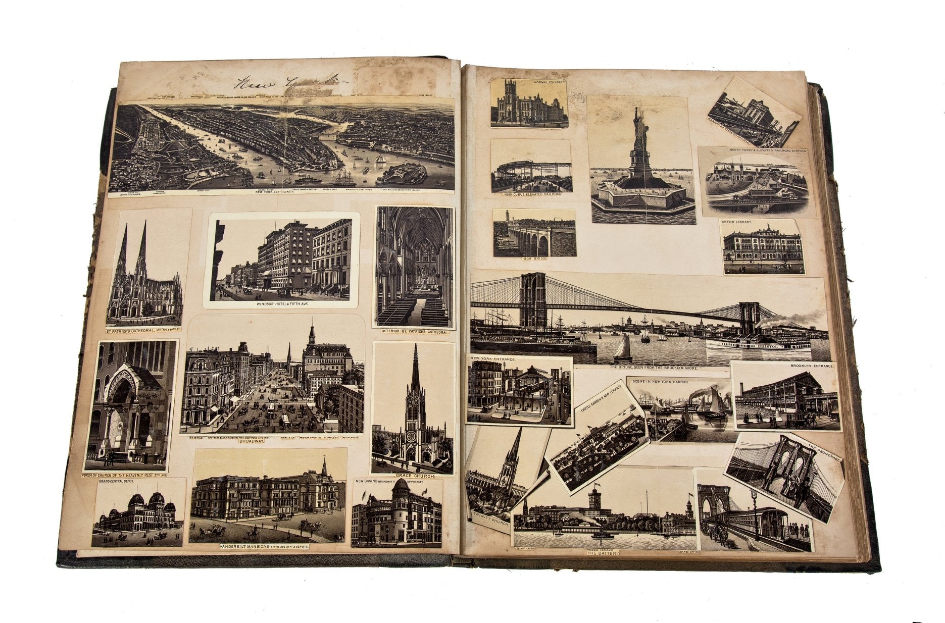 amazingly intact late 19th century hardbound scrapbook containing a combination of albumen prints and lithographs of major american cities