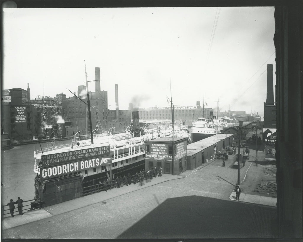 group of early 20th century kaufamnn and fabry silver gelatin prints of chicago buildings, boats, and bridges