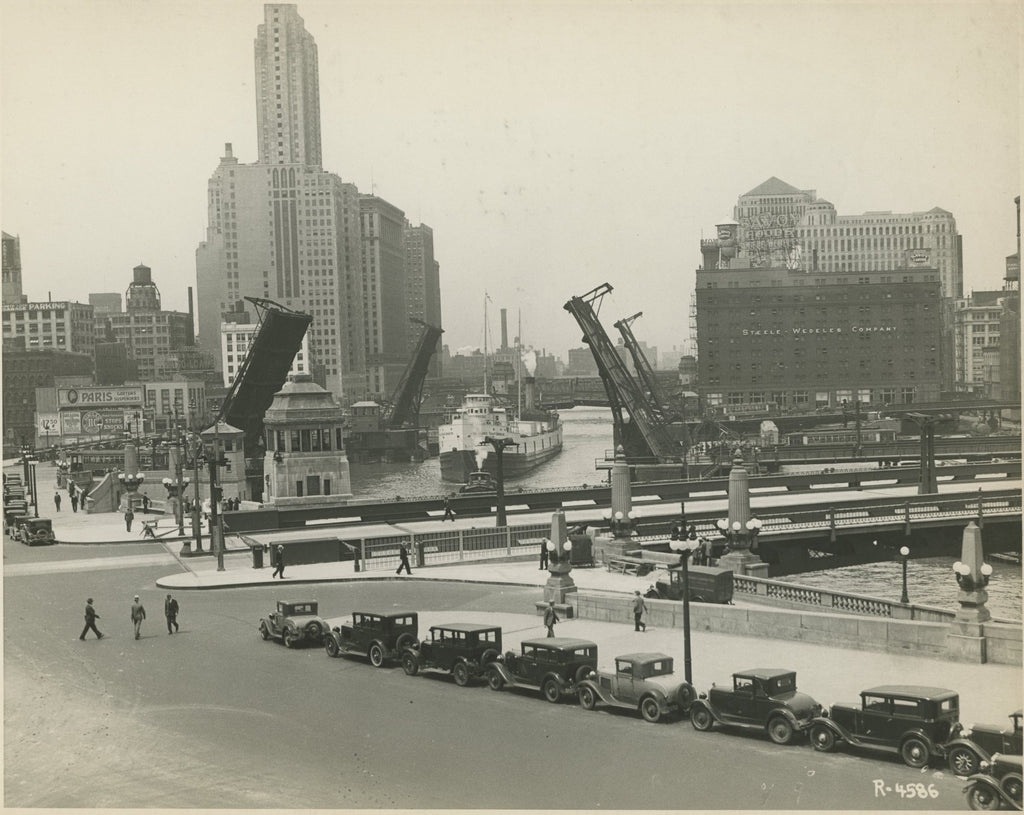 group of early 20th century kaufamnn and fabry silver gelatin prints of chicago buildings, boats, and bridges