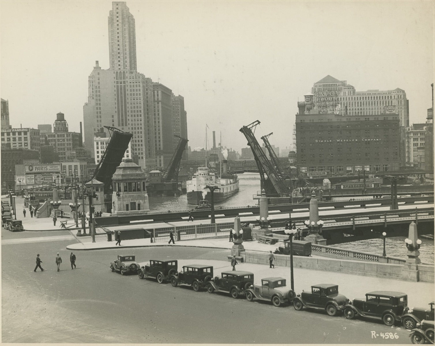group of early 20th century kaufamnn and fabry silver gelatin prints of chicago buildings, boats, and bridges