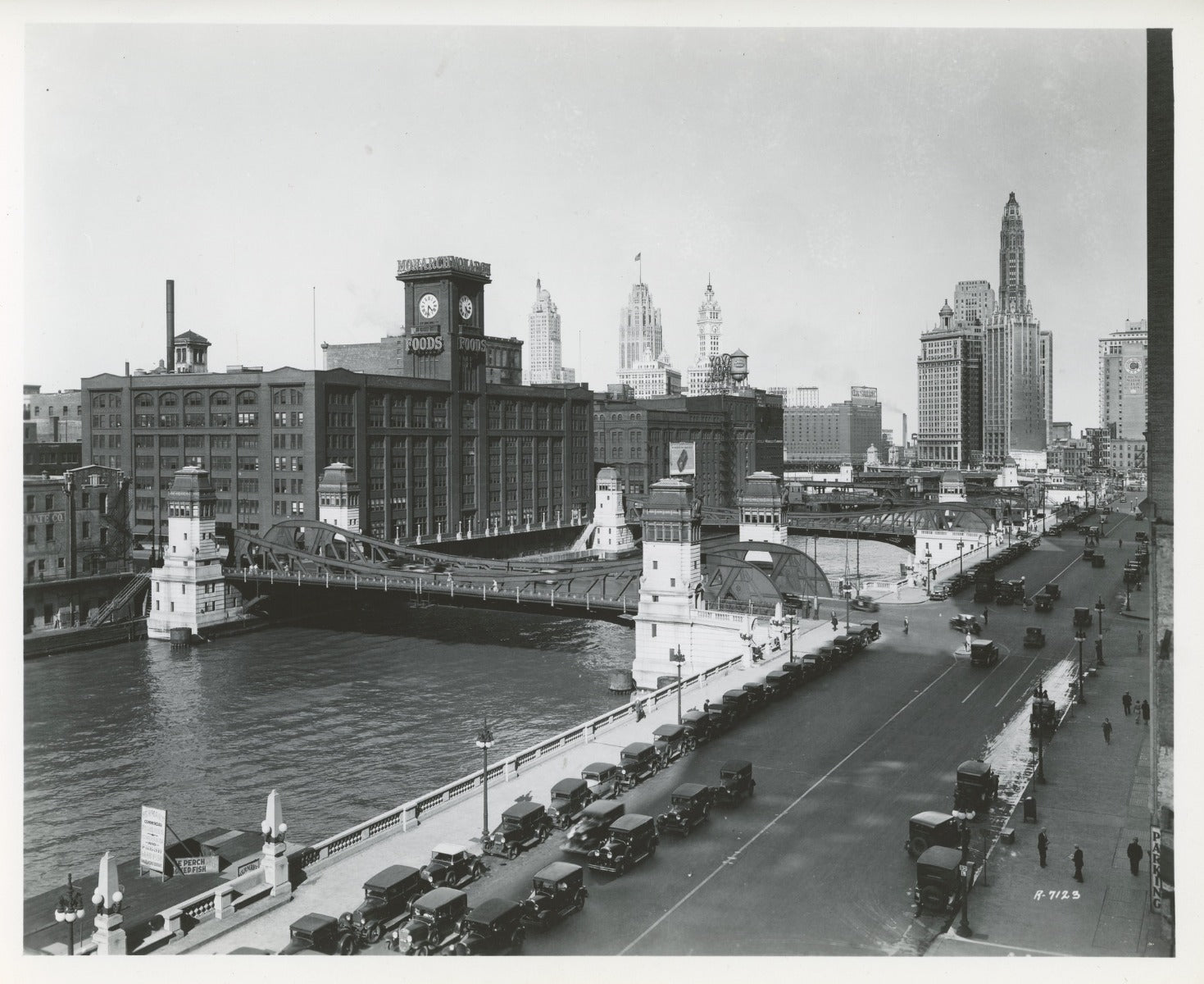 group of early 20th century kaufamnn and fabry silver gelatin prints of chicago buildings, boats, and bridges