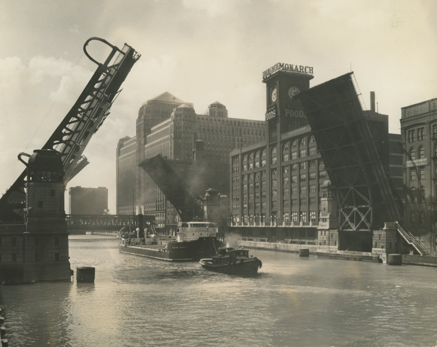 group of early 20th century kaufamnn and fabry silver gelatin prints of chicago buildings, boats, and bridges