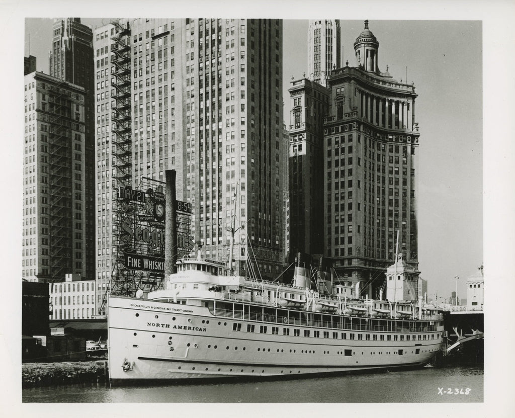 group of early 20th century kaufamnn and fabry silver gelatin prints of chicago buildings, boats, and bridges