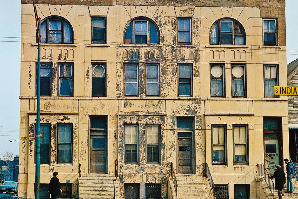 matching set of custom-designed staircase oak wood spindles from adler and sullivan's max. m. rothschild rowhouses (1883), located at 3201-3205 south indiana avenue, chicago, il.