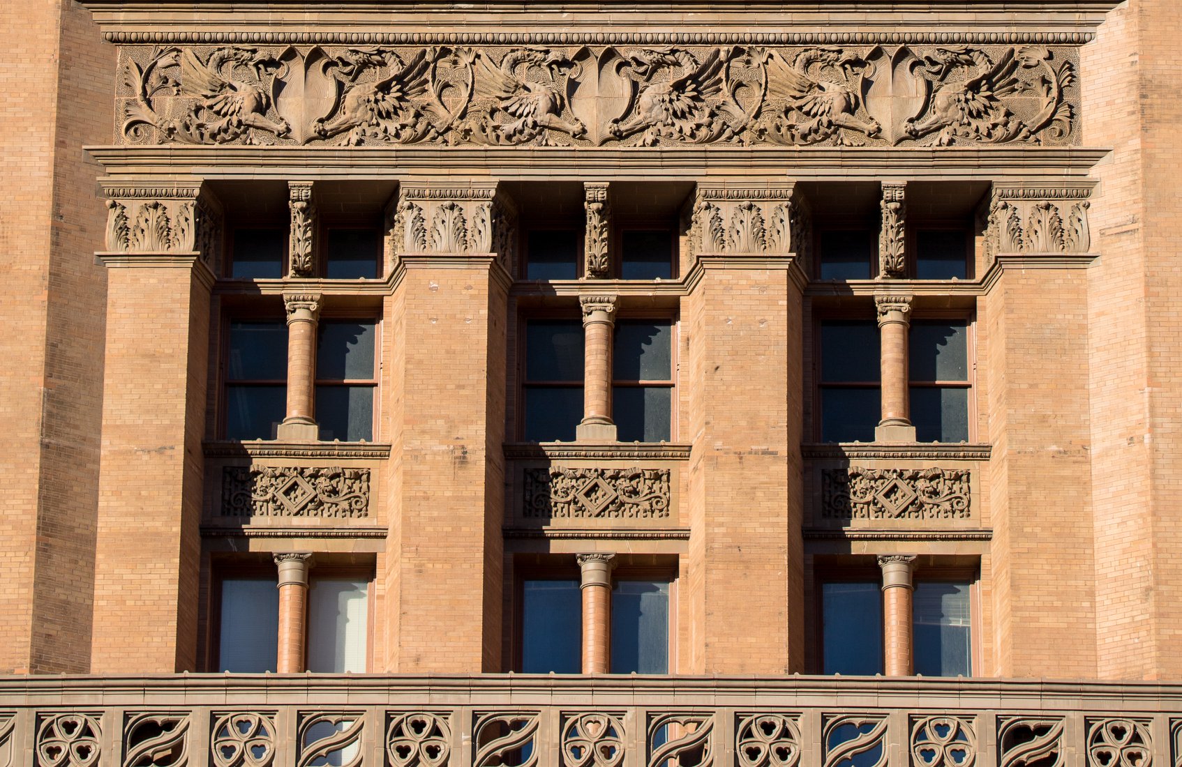 original 1895 henry c. koch-designed buff-colored terra cotta balustrade from milwaukee city hall