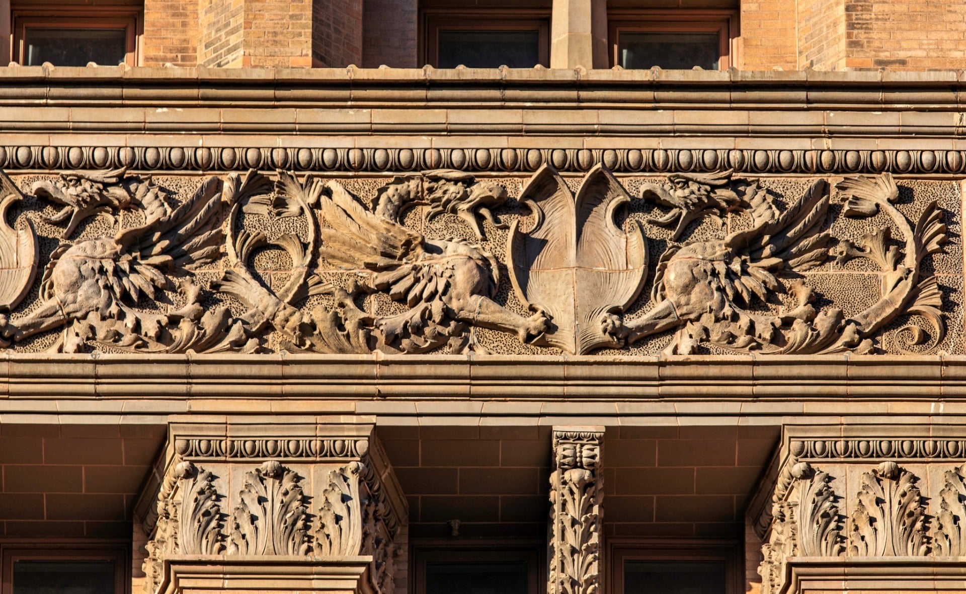 original 1895 henry c. koch-designed buff-colored terra cotta balustrade from milwaukee city hall