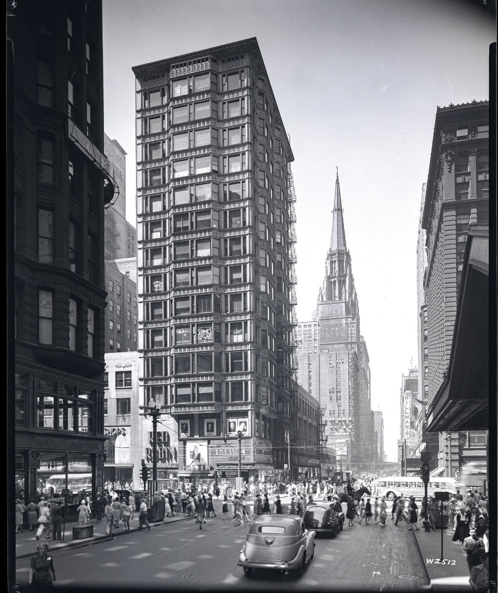 original white glazed terra cotta reliance building roofline module with intact wood sash frame and plate glass window