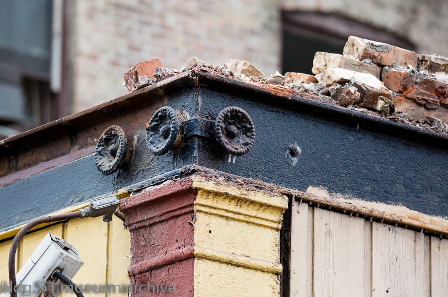 original 19th century salvaged chicago james h. higgie building exterior facade cast iron storefront tie-rod rosette