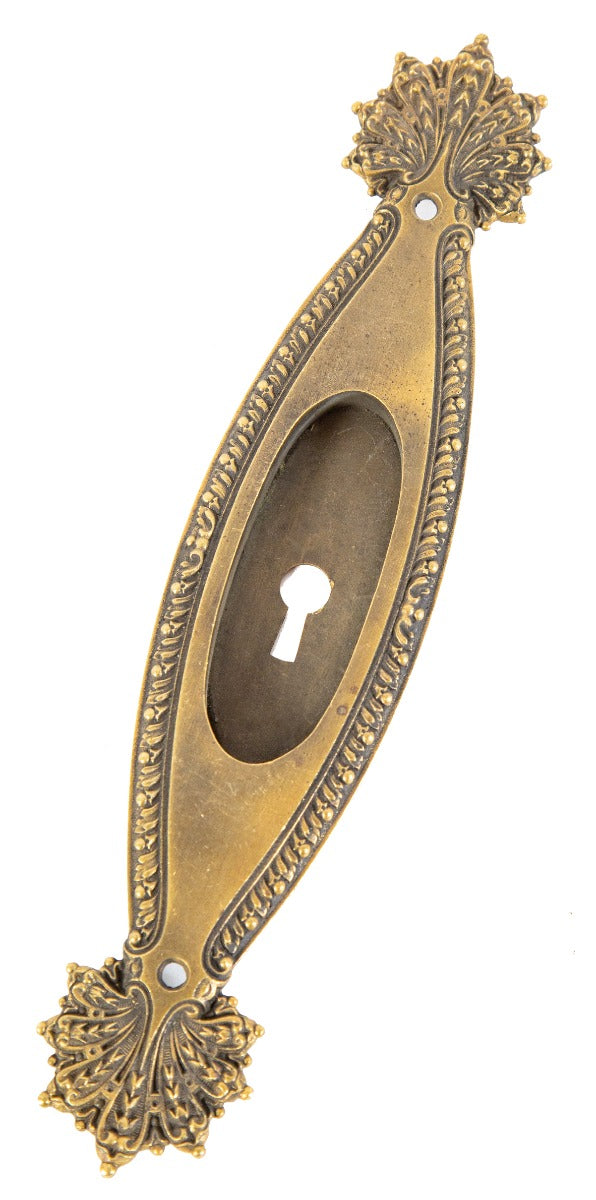 single hard-to-find early 20th century oversized ornamental cast brass "marquise" pattern residential pocket door backplate