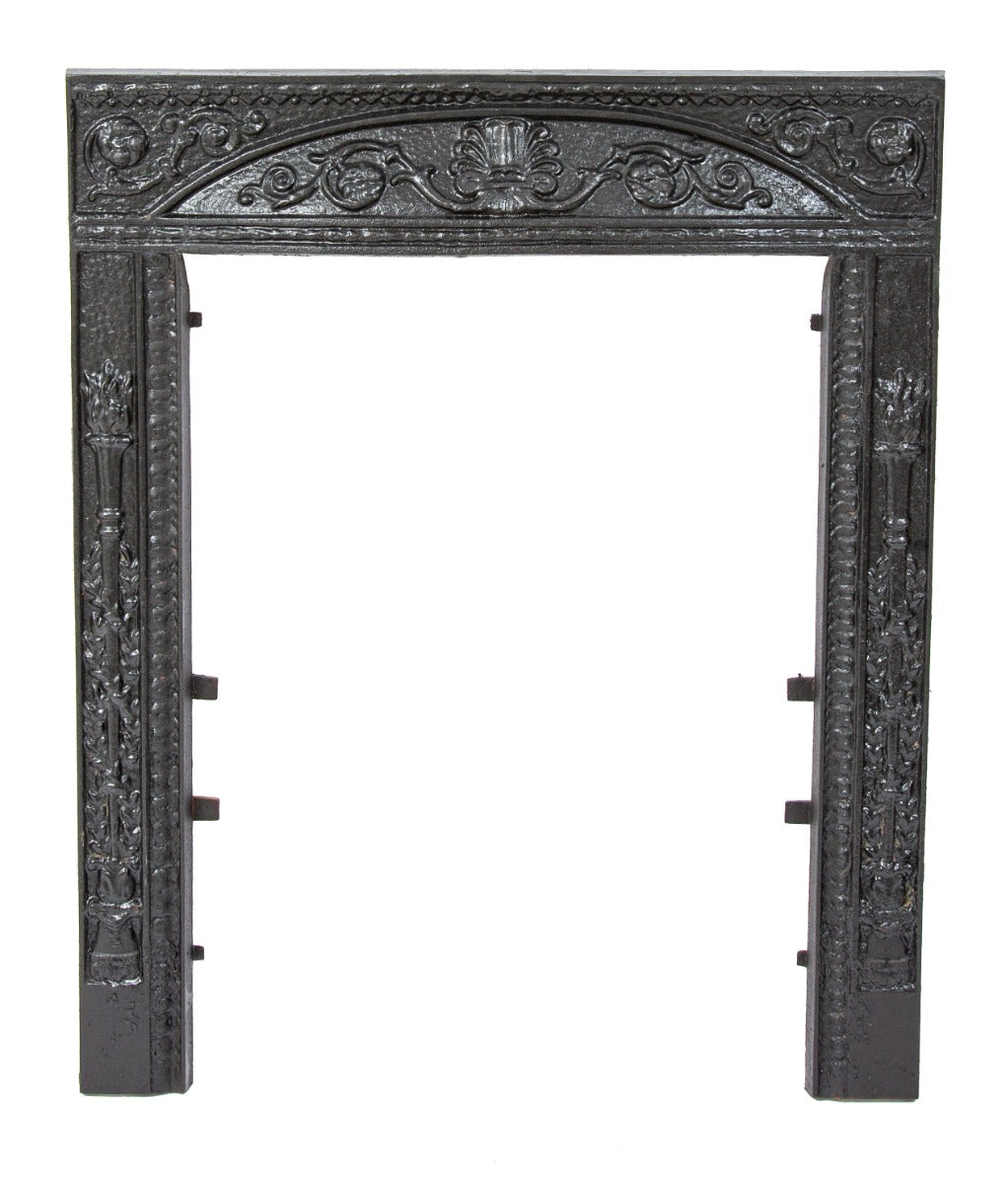 19th century salvaged chicago dawson brothers ornamental cast iron fireplace surround with black enameled finish